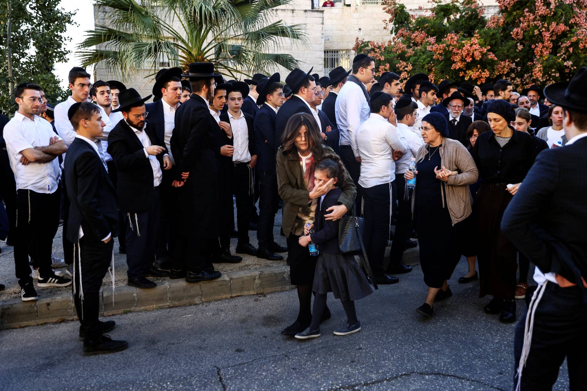 Mourners attend the funeral of 16-year-old Aryeh Shechopek, who was killed in a suspected Palestinian bomb attack in Jerusalem on Wednesday.  | REUTERS 