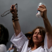 A demonstrator holds a painting with the image of the Virgin Mary during a protest against abortion in Bogota, Colombia, on Wednesday. | REUTERS 
