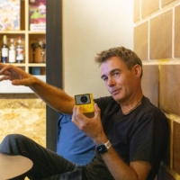 Chuhai Labs founder Giles Goddard holds a Playdate. He came up with the pitch for the game Whitewater Wipeout, which was subsequently the first title released for the Playdate.  | ERTUG SAYIN
