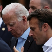 U.S. President Joe Biden and French leader Emmanuel Macron attend the Group of Seven leaders summit at the Bavarian resort of Schloss Elmau castle, near Garmisch-Partenkirchen, Germany, in June. | POOL / VIA REUTERS