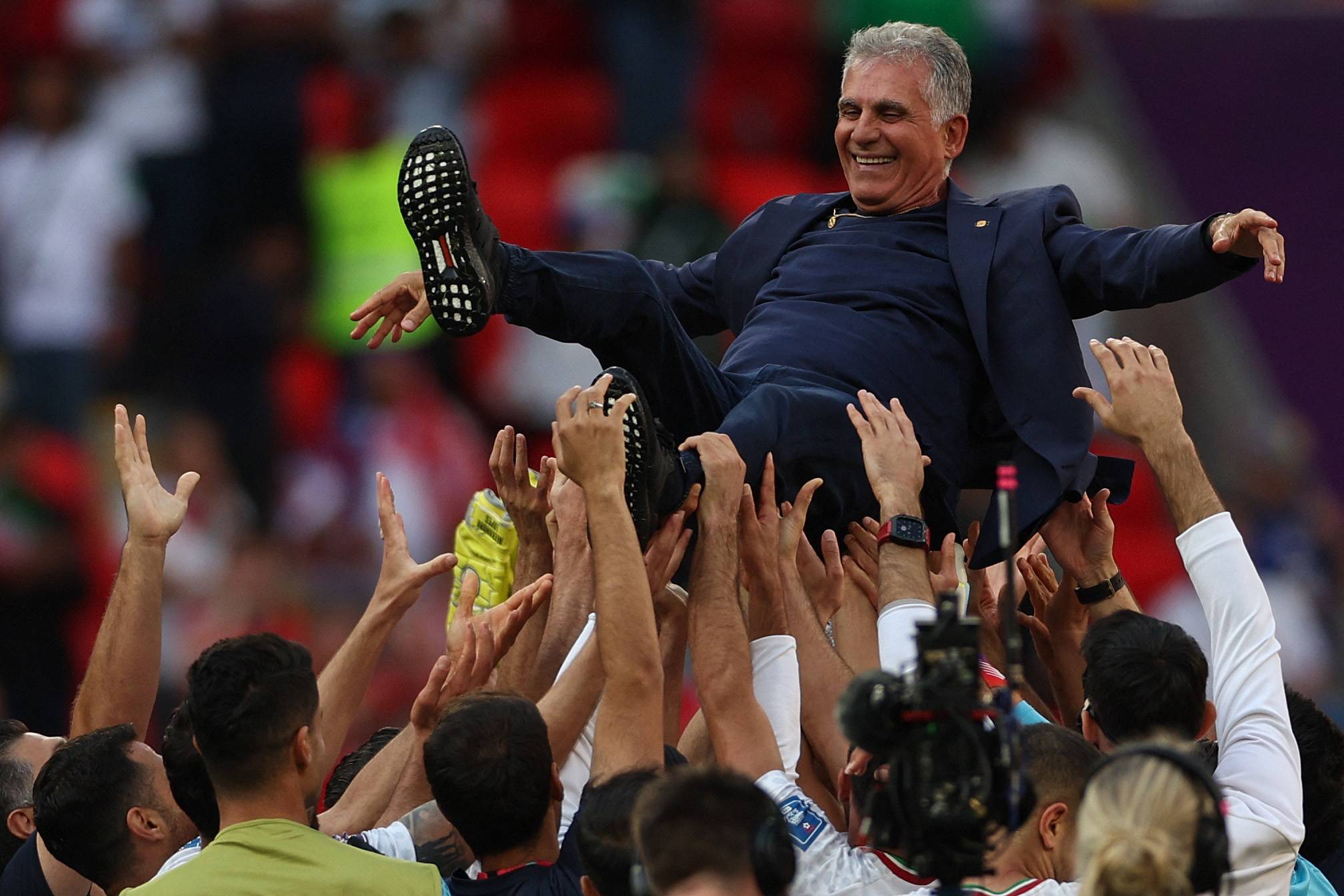 Iran coach Carlos Queiroz has called German soccer icon Jurgen Klinmann's comments toward his team 'a disgrace to football.' | AFP-JIJI