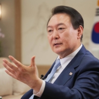 South Korean President Yoon Suk-yeol speaks during an interview in Seoul on Monday. | REUTERS
