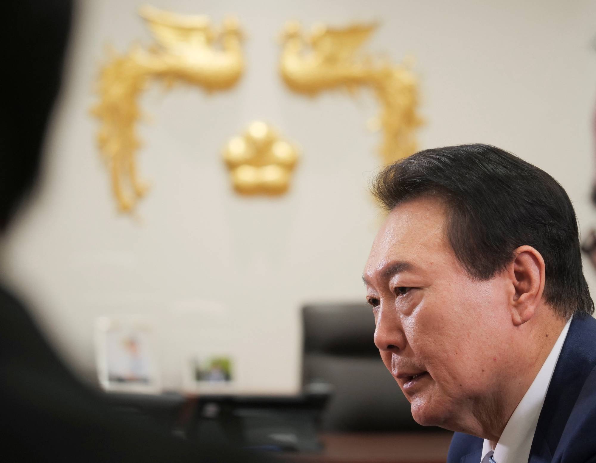 South Korean President Yoon Suk-yeol speaks during an interview in Seoul on Monday. | REUTERS