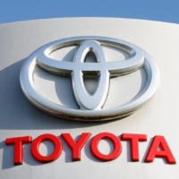 Toyota cut its annual output target earlier this month as it battles rising material costs and a persistent chip shortage. | REUTERS