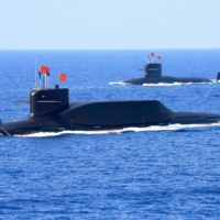 A Chinese Navy nuclear-powered Jin-class ballistic missile submarine is seen during a military event in the South China Sea in April 2018.  | REUTERS