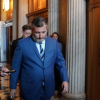 U.S. Senator Ted Cruz walks through the U.S. Capitol before the weekly Republican caucus luncheon in Washington on Tuesday. | REUTERS
