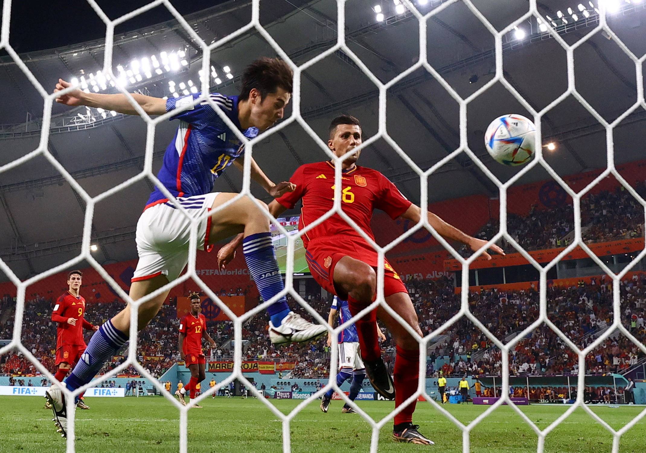 Japan defeats Spain to advance in shock World Cup upset