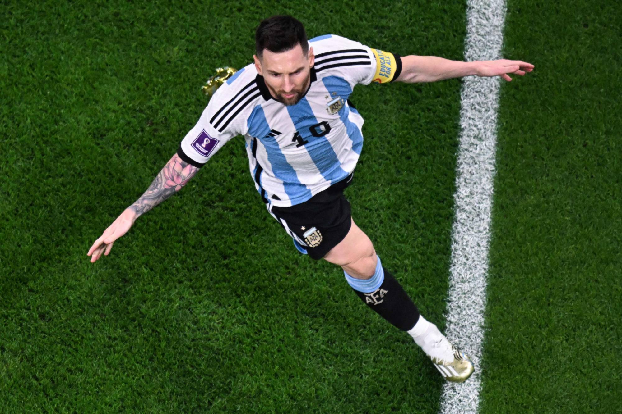 Argentina forward Lionel Messi celebrates after scoring his team's first goal during the Round of 16 2022 FIFA World Cup match against Australia in Al-Rayyan, Qatar, on Saturday. | AFP-JIJI
