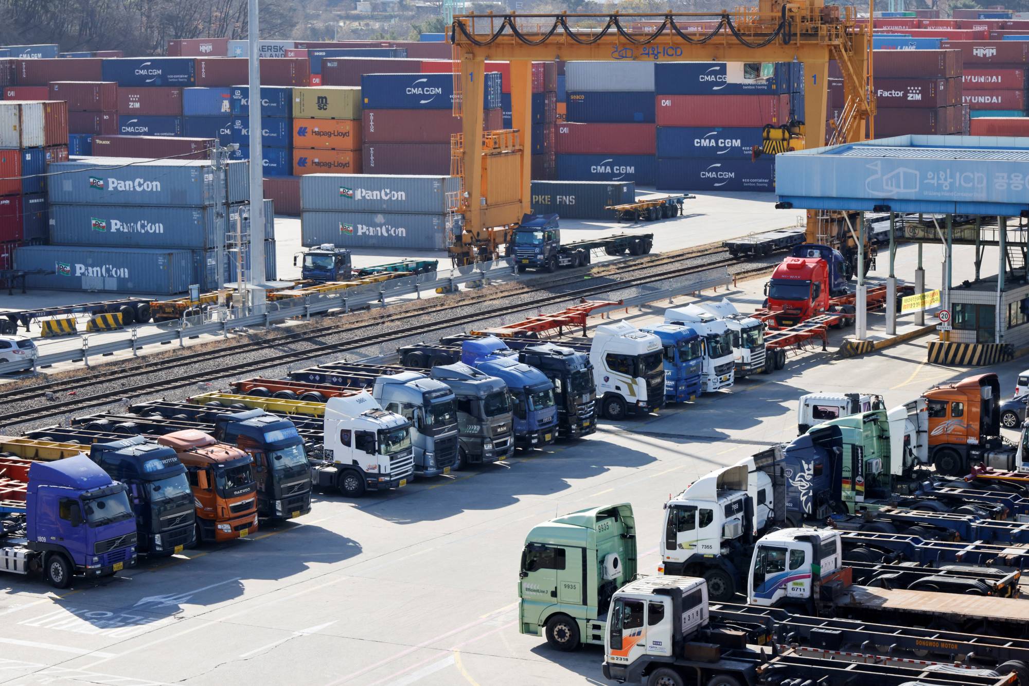 Trucks parked at a terminal at the Inland Container Depot in Uiwang, South Korea, on Nov. 30 | REUTERS