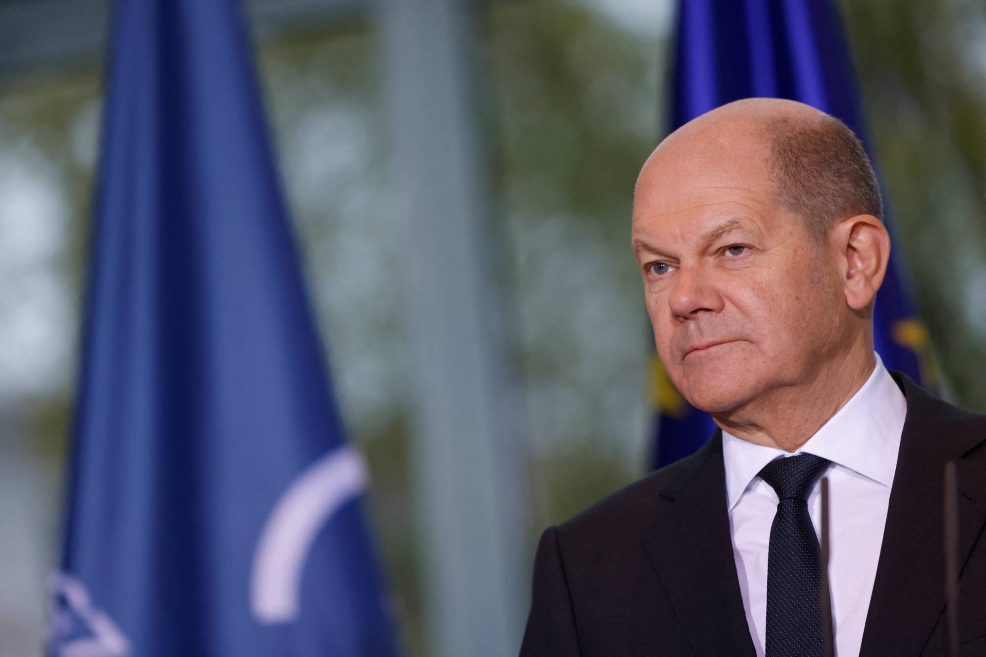 Germany's Olaf Scholz weathers shocks in turbulent first year - The