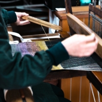 Many Yonezawa textile firms make frequent use of safflower dye, a symbol of the region known across Japan. | COURTESY OF NITTA TEXTILE ART INC.