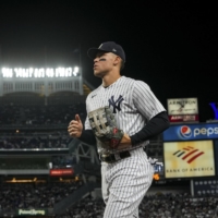 Aaron Judge of the New York Yankees runs to the dugout during a game against the Baltimore Orioles at Yankee Stadium in New York on Sept. 30. | DESIREE RIOS / THE NEW YORK TIMES