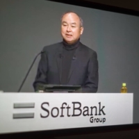 Masayoshi Son, chairman and chief executive officer of SoftBank Group, speaks during an online news conference in February. | BLOOMBERG