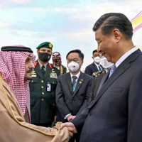China\'s President Xi Jinping is received by the Governor of Riyadh province Prince Faisal bin Bandar al-Saud at King Khalid International Airport in Riyadh on Wednesday. | AFP PHOTO / HO / SPA