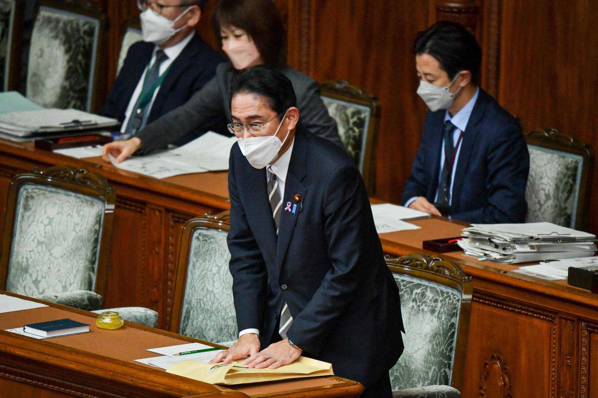 Prime Minister Fumio Kishida attends a House of Representatives plenary session in Tokyo on Nov. 21. | AFP-JIJI