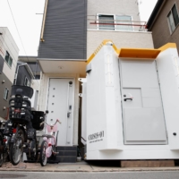Megumi Morohoshi and her family installed a bomb shelter in front of their house in Saitama Prefecture partly in response to North Korean missile threats. | REUTERS
