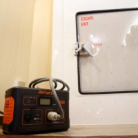 A portable battery unit and escape door in Morohoshi\'s shelter | REUTERS