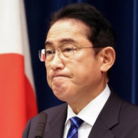 Prime Minister Fumio Kishida speaks during a news conference in Tokyo on Saturday. | POOL / VIA AFP-JIJI
