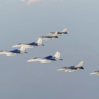 Self-Defense Forces and U.S. armed forces conduct a bilateral exercise over the Sea of Japan on Nov. 18. | MINISTRY OF DEFENSE / VIA AFP-JIJI