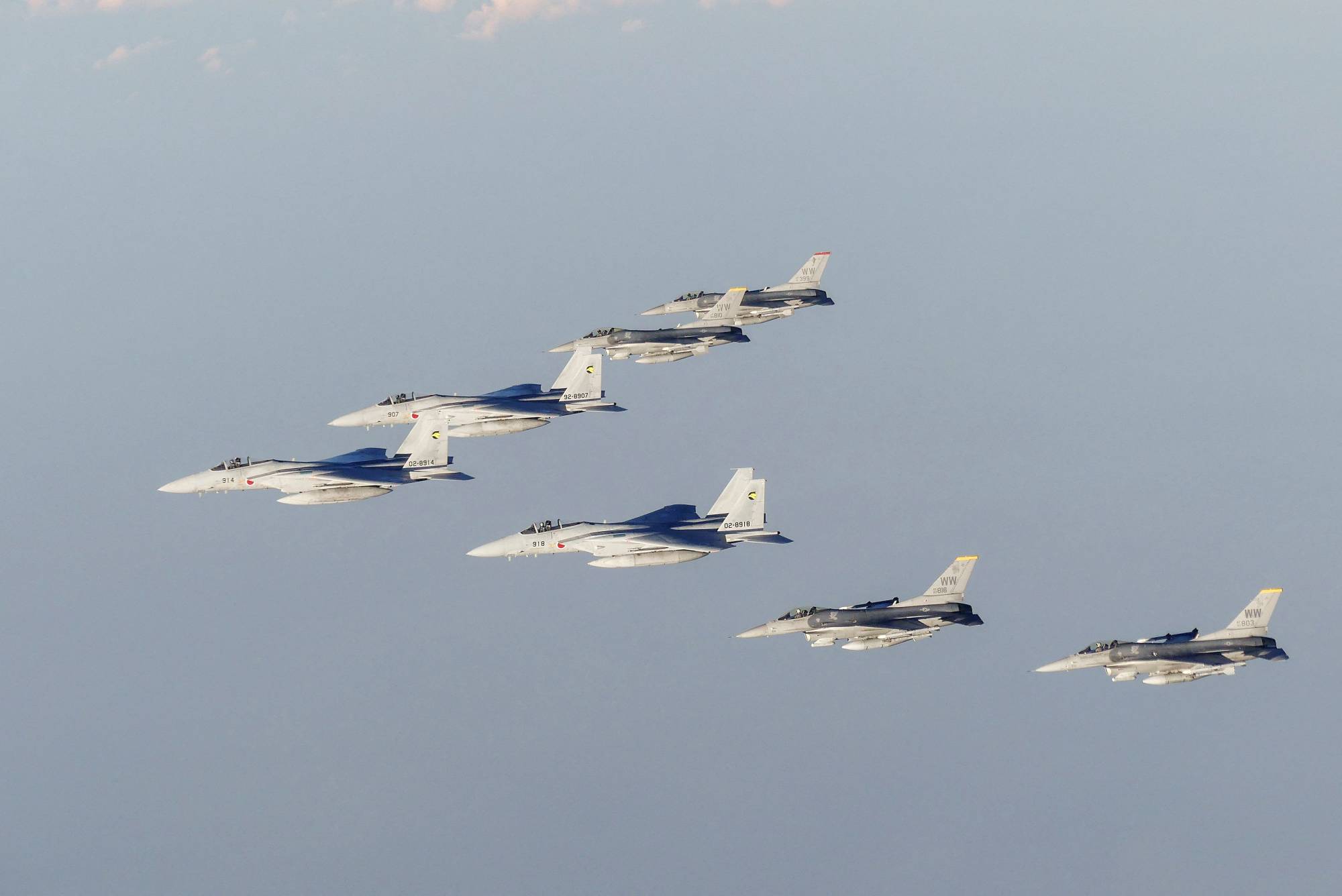 Self-Defense Forces and U.S. armed forces conduct a bilateral exercise over the Sea of Japan on Nov. 18. | Ministry of Defense / via AFP-JIJI