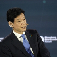 Economy minister Yasutoshi Nishimura has been asked by the U.S. to have Japan join in with tightening controls over the export of advanced chipmaking machinery to China. | BLOOMBERG