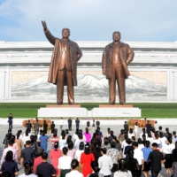 Statues of North Korea\'s founder Kim Il Sung and late leader Kim Jong Il in Pyongyang | KCNA / VIA REUTERS  