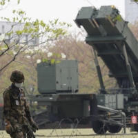 A Patriot Advanced Capability-3 missile launcher is stationed at the Defense Ministry in Tokyo in April 2013.  | REUTERS