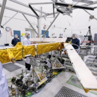 Members of the international Surface Water and Ocean Topography radar satellite mission test one of the antennas at NASA\'s Jet Propulsion Laboratory in Pasadena, California. | NASA / JPL-CALTECH / VIA REUTERS