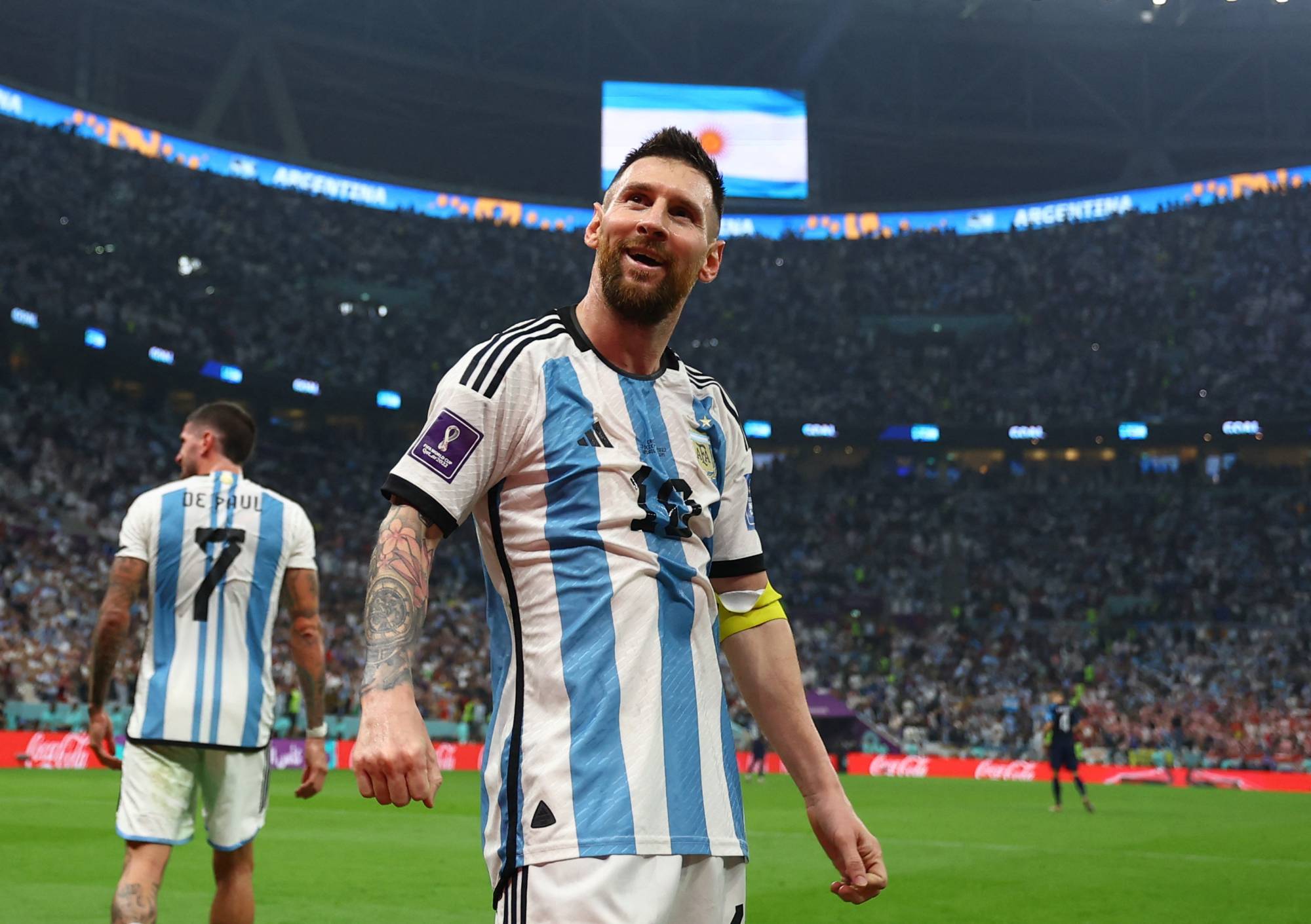 Argentina's Lionel Messi celebrates his team's third goal, scored by Julian Alvarez, during their 2022 FIFA World Cup semifinal against Croatia in Lusail, Qatar, on Tuesday. | REUTERS
