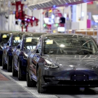 Tesla Model 3 vehicles at the company\'s factory in Shanghai | REUTERS 