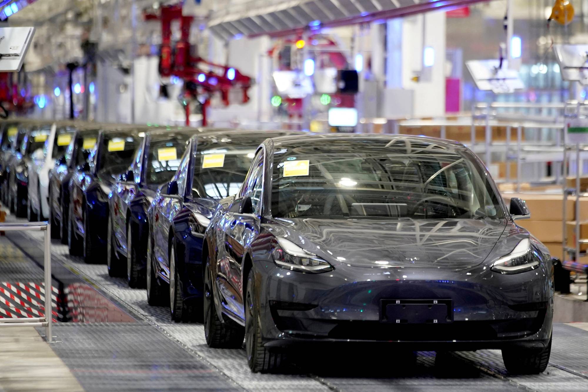 Tesla Model 3 vehicles at the company's factory in Shanghai | Reuters 