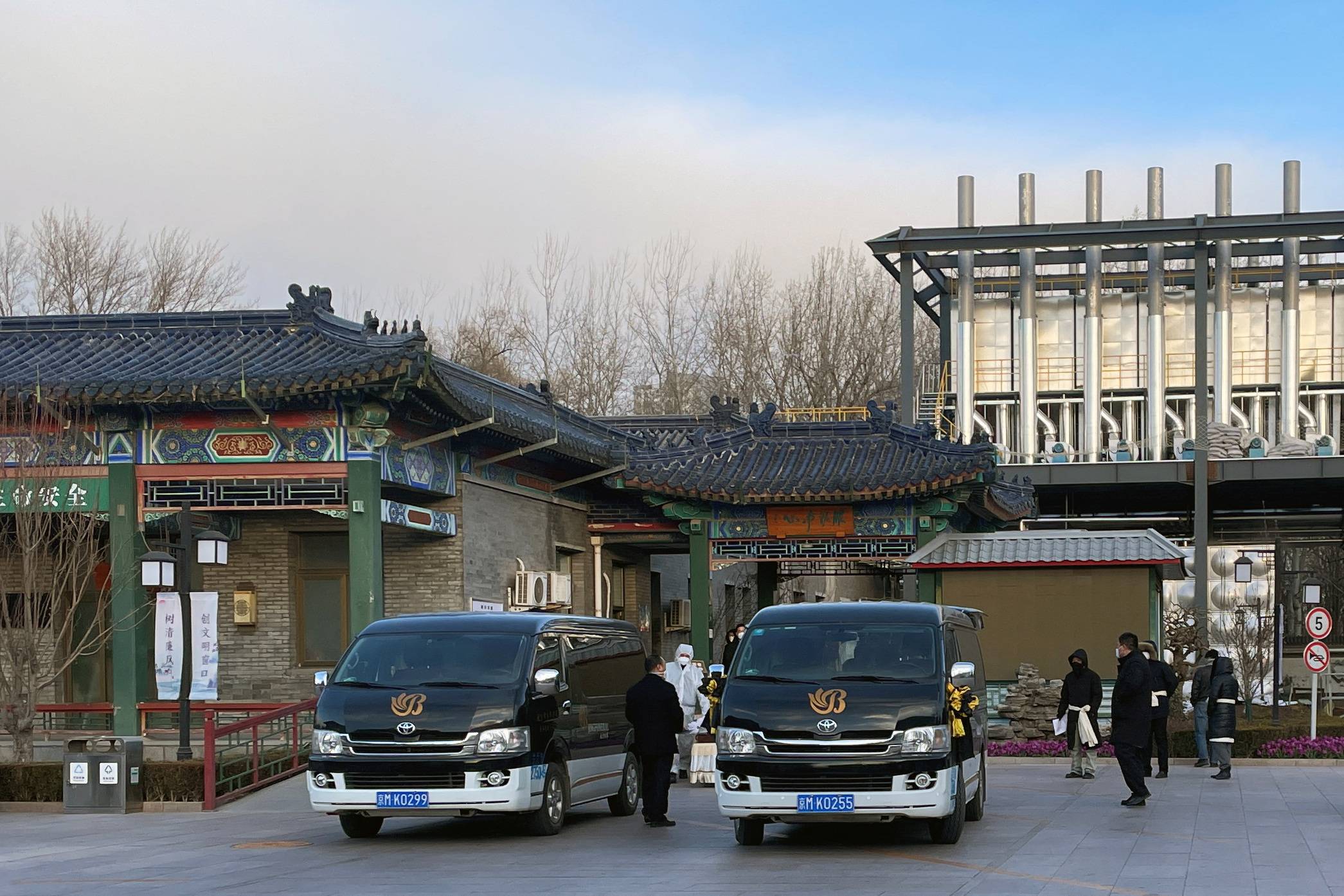 Workers move a casket outside a crematorium at a funeral home in Beijing on Saturday. | Reuters