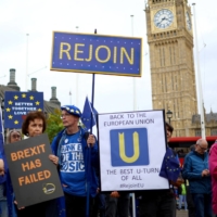 Protesters take part in a march calling for Britain to rejoin the European Union in London on Oct. 22. | REUTERS