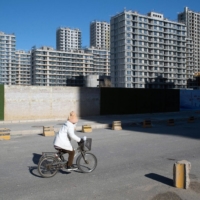 Residential buildings under construction in Beijing last week | BLOOMBERG 