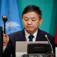 Chinese Ecology and Environment Minister Huang Runqiu opens the plenary session for the tail end of the COP15 biodiversity conference in Montreal on Monday. | AFP-JIJI