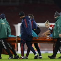 Arsenal\'s Vivianne Miedema is stretchered off after sustaining an injury during the team\'s Women\'s Champions League game against Olympique Lyonnais in London on Thursday. | REUTERS