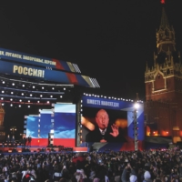 Russian President Vladimir Putin speaks during a concert in September in support of the annexation of four Ukrainian regions. | GETTY IMAGES