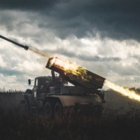 A BM-21 multiple rocket launcher fires at Russian positions in the Kharkiv region in October. |  YASUYOSHI CHIBA / AFP / VIA GETTY IMAGES