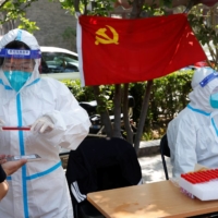 China and its leaders have come to the realization that COVID-19 cannot be avoided forever. | REUTERS
