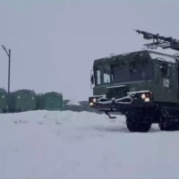 A still of a video released Dec. 5 showing a Russian military vehicle on a Northern Territories island claimed by Japan. | RUSSIAN DEFENSE MINISTRY HANDOUT / VIA REUTERS