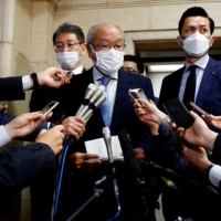 Finance Minister Shunichi Suzuki in Tokyo on Tuesday | REUTERS