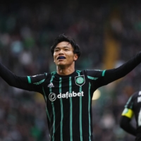 Reo Hatate celebrates after scoring Celtic\'s opening goal against St. Johnstone in Glasgow, Scotland, on Saturday. | REUTERS