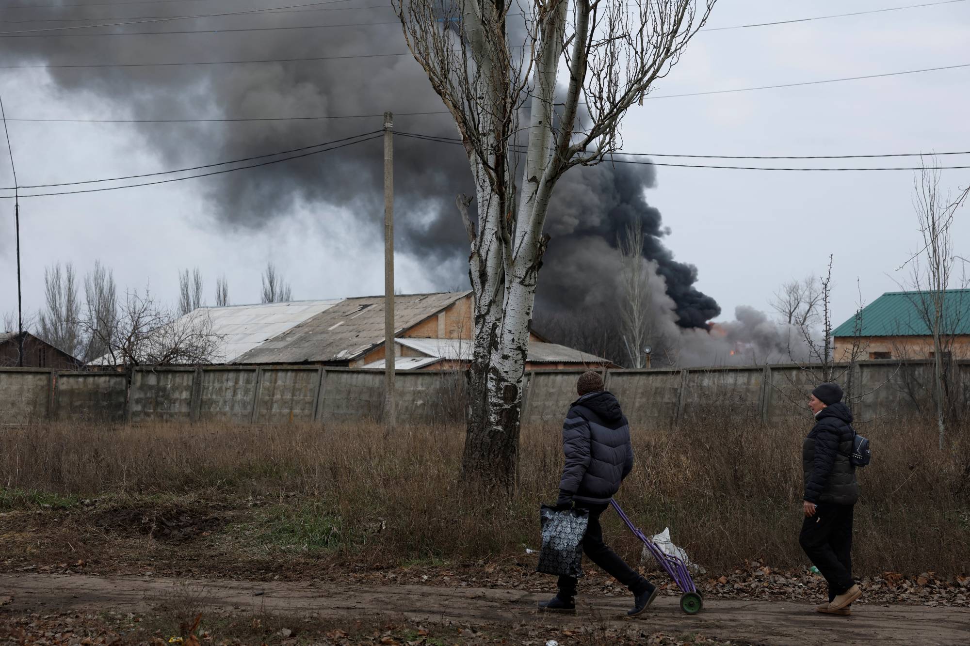 Smoke billows from an industrial building after a missile strike in Bakhmut, Ukraine, on Sunday | REUTERS