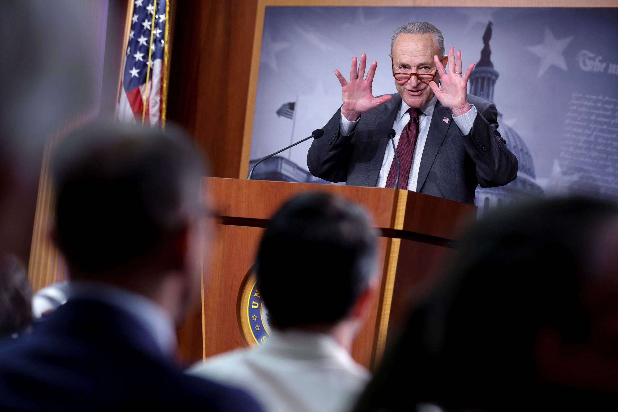 U.S. Senate Majority Leader Chuck Schumer holds a news conference at the U.S. Capitol on Dec. 22 after lawmakers passed a massive omnibus spending bill.  | REUTERS