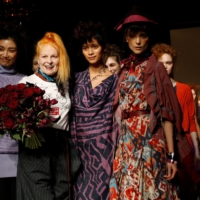 Designer Vivienne Westwood poses on the catwalk with her models after the presentation of her autumn/winter collection during the 2012 London Fashion Week. | REUTERS