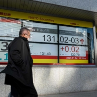 An electronic board shows the rate of the yen against the U.S. dollar in Tokyo on Wednesday.  | AFP-JIJI