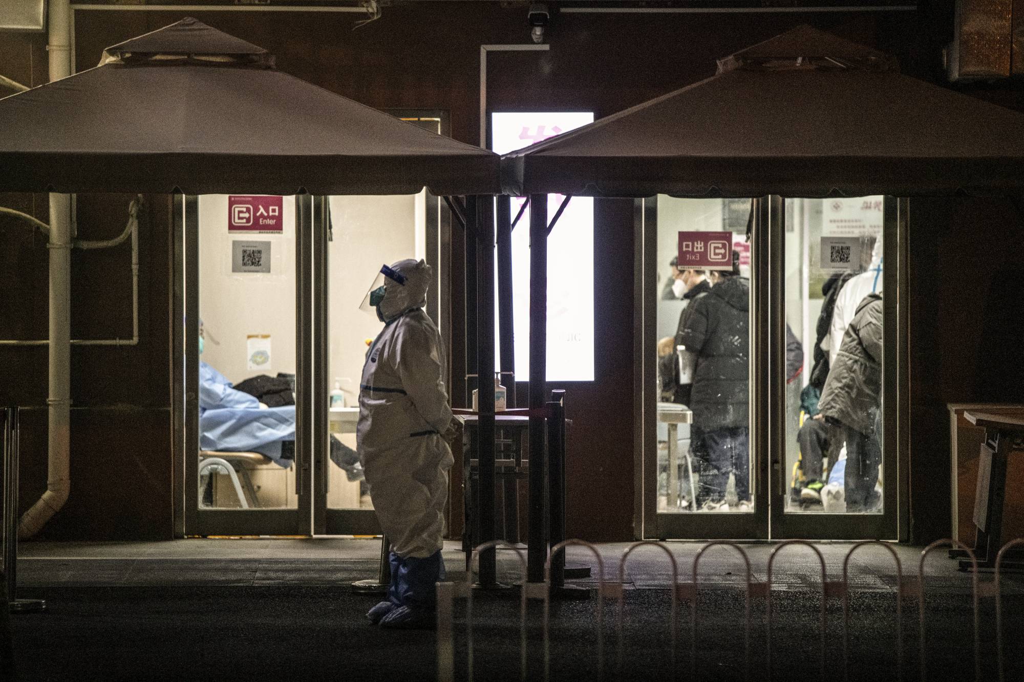 The entrance to a busy fever clinic in Beijing on Dec. 20.  | GILLES SABRIE / THE NEW YORK TIMES