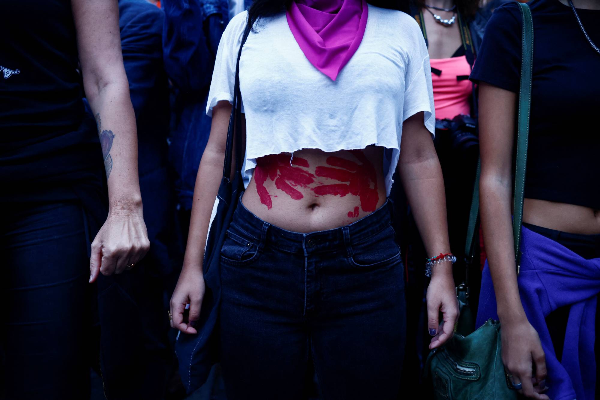 A woman at a protest organized by the Non Una di Meno (Not One Less) movement and feminist collectives to mark International Safe Abortion Day, in Rome on Sept. 28. | REUTERS