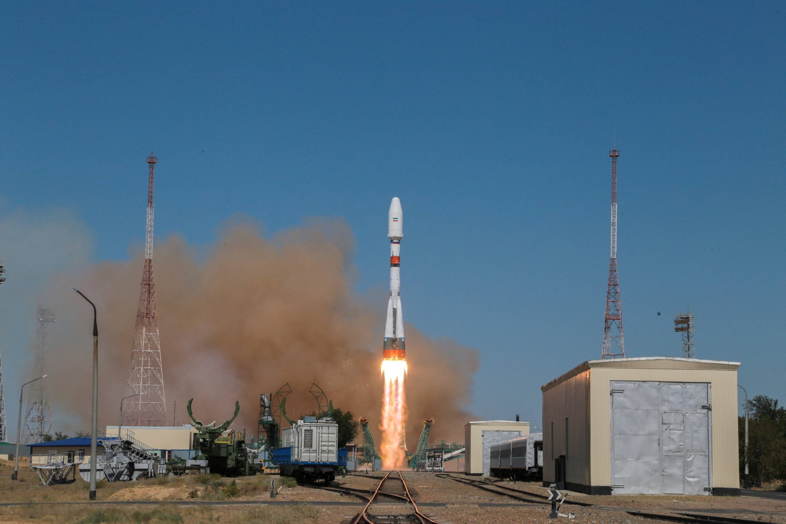 A Russian Soyuz2.1b rocket launches a satellite into orbit from the Baikonur Cosmodrome in Kazakhstan in August. | ROSCOSMOS / VIA REUTERS  