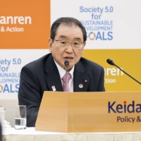 Keidanren Chairman Masakazu Tokura speaks during a news conference in Tokyo on Tuesday. | KYODO